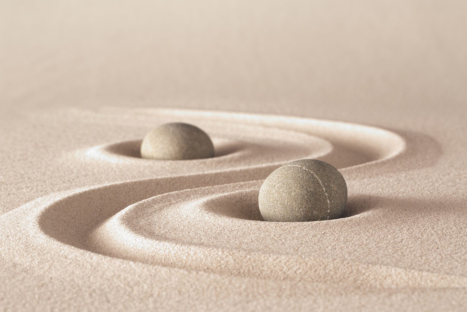 Zen garden meditation stones and lines in sand