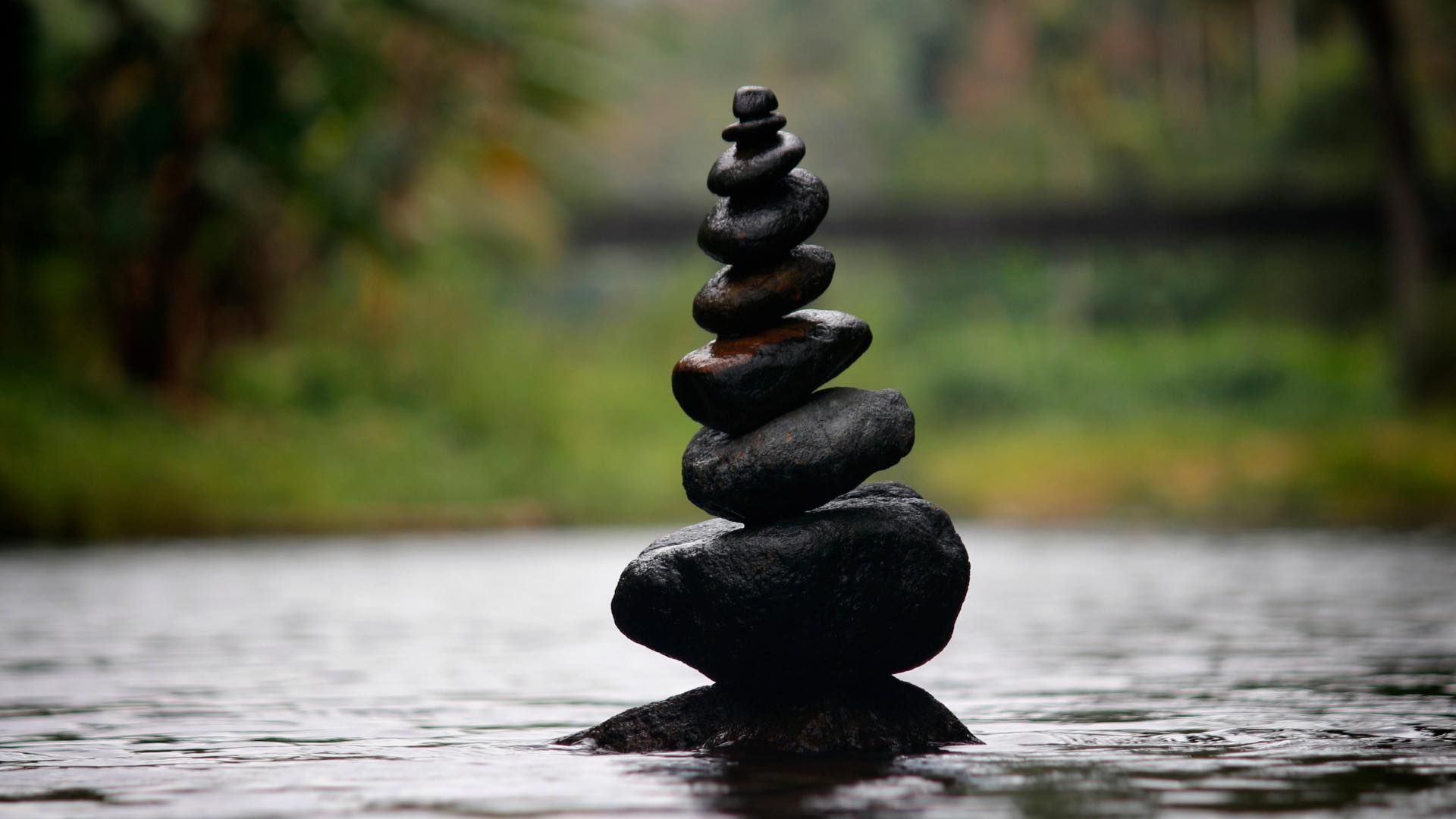 Meditation concept, Stones one on top of other in water
